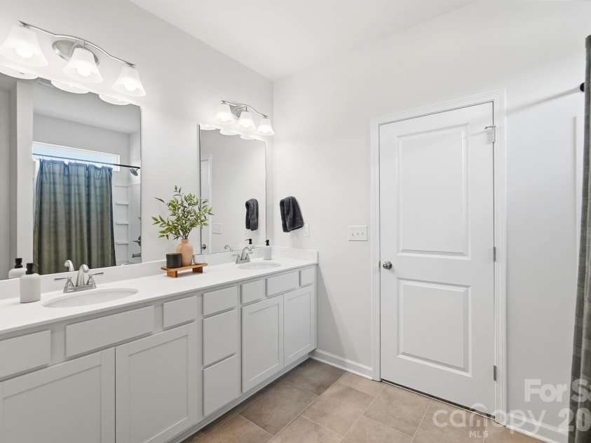 6023 Busch Way, Midland, NC 28107.  MLS# CAR4397614, YatesRealty ID 39883. Spacious primary bathroom with excellent counter and storage space.