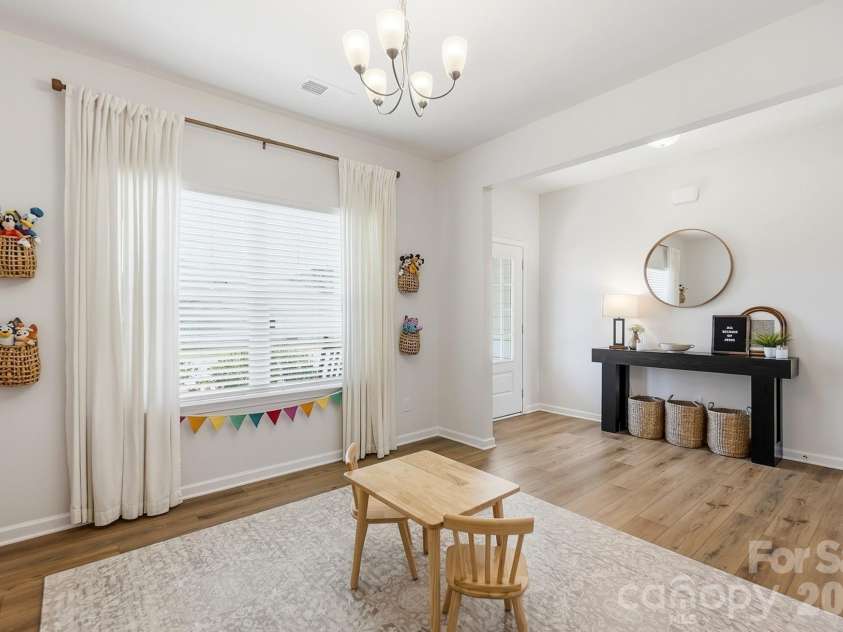 6023 Busch Way, Midland, NC 28107.  MLS# CAR4397614, YatesRealty ID 39883. Versatile front flex room- perfect for an office, playroom, or dining space.