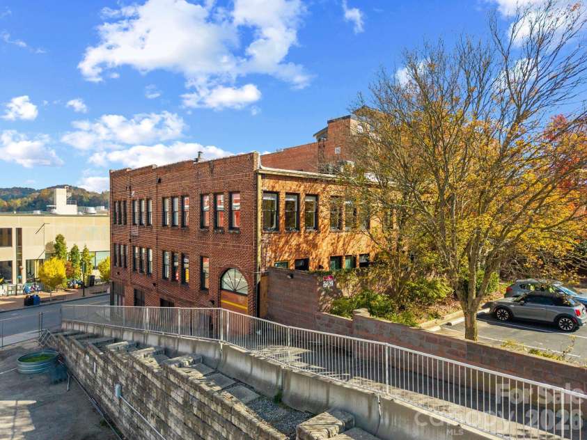 60 Haywood Street, Asheville, NC 28801.  MLS# CAR4317577, YatesRealty ID 39889. Ideal Downtown Setting