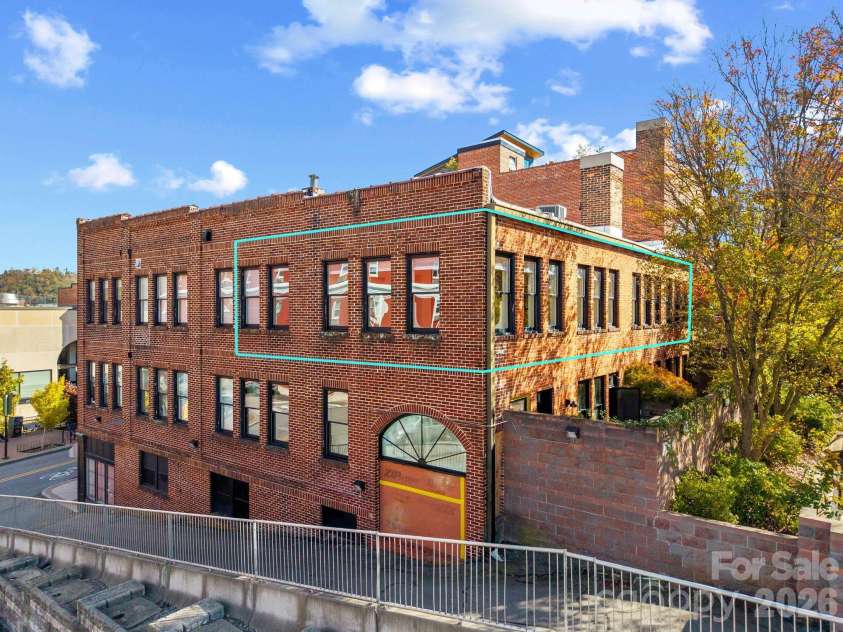 60 Haywood Street, Asheville, NC 28801.  MLS# CAR4317577, YatesRealty ID 39889. Top Floor, Corner Unit