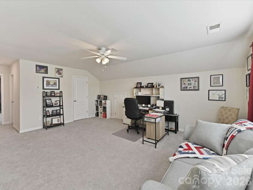 3302 Oliver Stanley Trail, Lancaster, SC 29720.  MLS# CAR4340248, YatesRealty ID 3989. Bonus Room with Walk in Closet and Fan. Walk in Attic Storage and additional Hall Closet for Storage