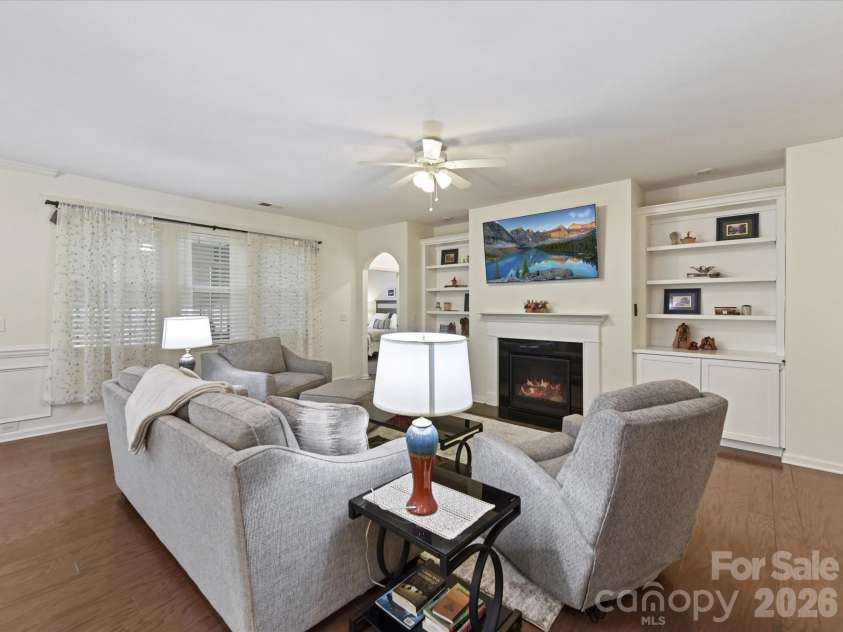 3302 Oliver Stanley Trail, Lancaster, SC 29720.  MLS# CAR4340248, YatesRealty ID 3989. Great Room Boasts of Built-in Cabinets and Shelving Flanking both sides of Gas Fireplace with Blower