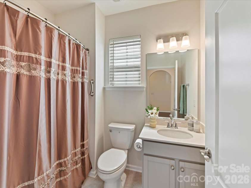 3302 Oliver Stanley Trail, Lancaster, SC 29720.  MLS# CAR4340248, YatesRealty ID 3989. Guest Bath with Quartz Counters, Tiled Flooring