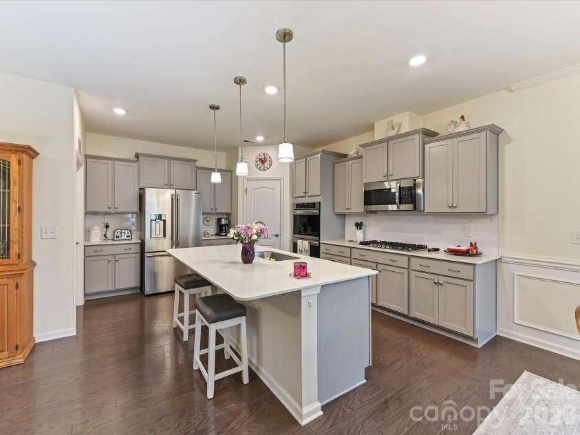 3302 Oliver Stanley Trail, Lancaster, SC 29720.  MLS# CAR4340248, YatesRealty ID 3989. Upgraded Light Pendants over Island and recessed Lighting