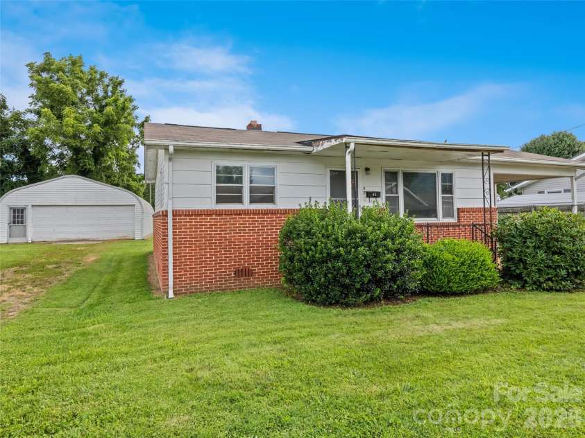 57 Spruce Street, Waynesville, NC 28786.  MLS# CAR4407581, YatesRealty ID 39908. 