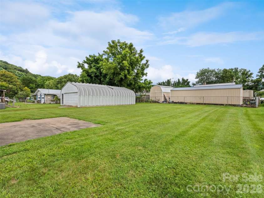 57 Spruce Street, Waynesville, NC 28786.  MLS# CAR4407581, YatesRealty ID 39908. 
