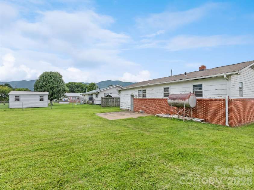 57 Spruce Street, Waynesville, NC 28786.  MLS# CAR4407581, YatesRealty ID 39908. 