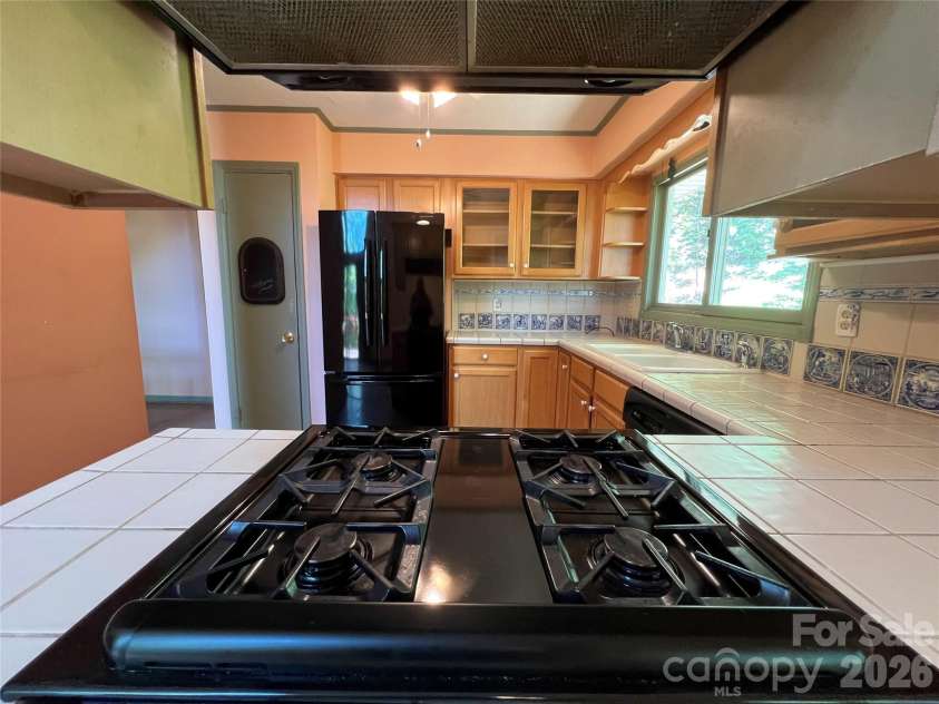 430 Laurel Heights Lane, Tryon, NC 28782.  MLS# CAR4277530, YatesRealty ID 3991. 