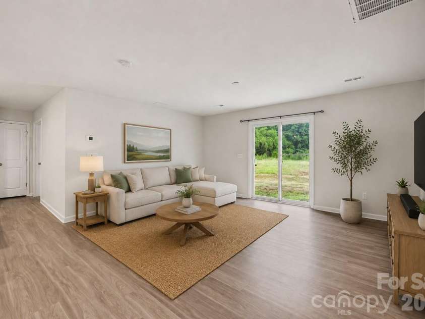 1512 Forkhorn Drive, Monroe, NC 28110.  MLS# CAR4407435, YatesRealty ID 39921. Virtually Staged Living Room
