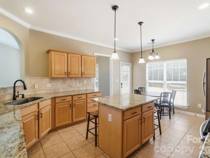 7015 Lenhart Drive, Charlotte, NC 28226.  MLS# CAR4407764, YatesRealty ID 39927. 