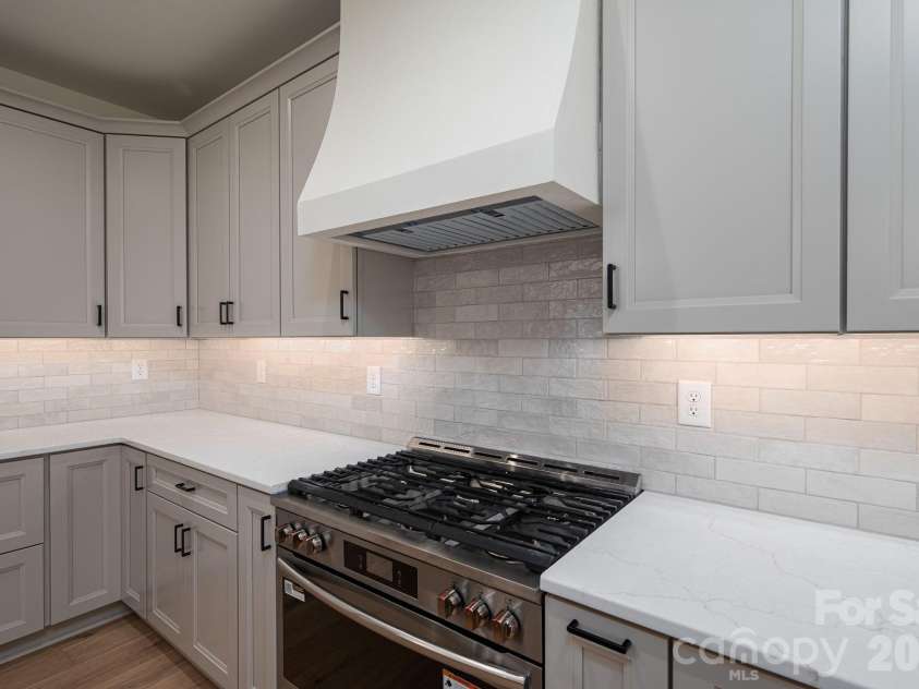 526 Aspen Street, Lincolnton, NC 28092.  MLS# CAR4403204, YatesRealty ID 39931. Stunning custom range hood with a 36