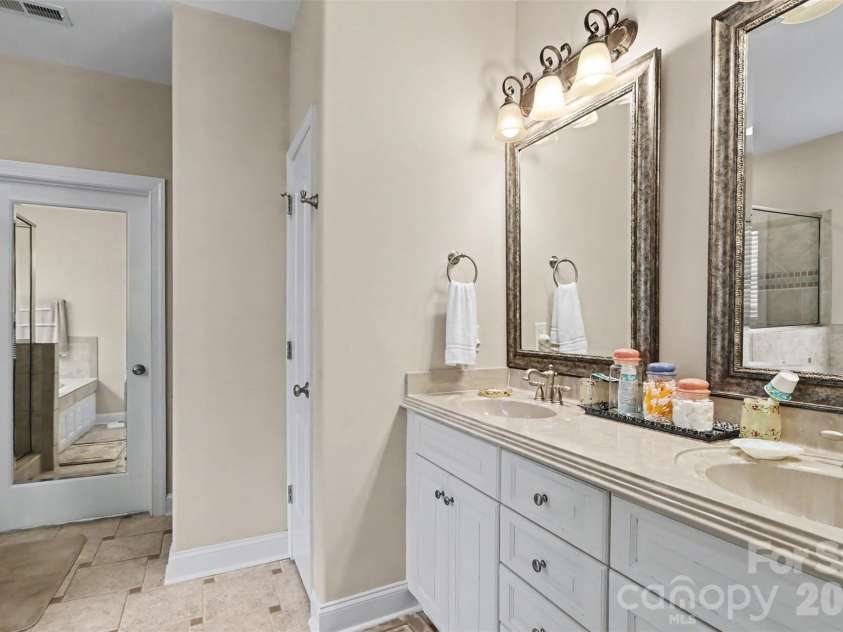 119 Blakemore Drive, Shelby, NC 28152.  MLS# CAR4404874, YatesRealty ID 39934. The primary ensuite bath is huge with a double vanity,...