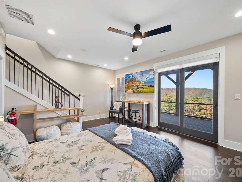 158 Elderberry Circle, Boone, NC 28607.  MLS# CAR4407222, YatesRealty ID 39935. Lower level bedroom w/ ensuite