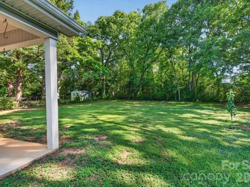 684 Union Cemetery Road, Concord, NC 28027.  MLS# CAR4403561, YatesRealty ID 39941. Back patio