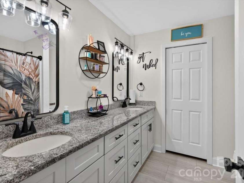 684 Union Cemetery Road, Concord, NC 28027.  MLS# CAR4403561, YatesRealty ID 39941. Master bathroom