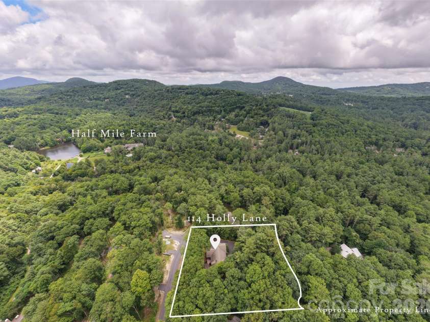 141 Dolly Lane, Highlands, NC 28741.  MLS# CAR4403878, YatesRealty ID 39950. 