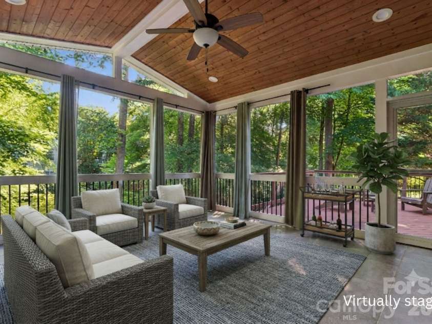 9727 Devonshire Drive, Huntersville, NC 28078.  MLS# CAR4398845, YatesRealty ID 39956. 16' x 16' Screened in porch with elegant Gable roof design - virtually staged
