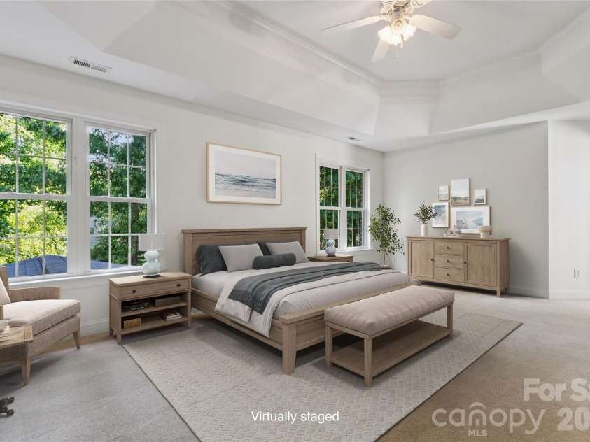 9727 Devonshire Drive, Huntersville, NC 28078.  MLS# CAR4398845, YatesRealty ID 39956. Large Primary Bedroom with double tray ceiling - virtually staged