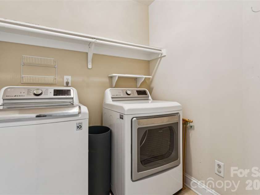 9727 Devonshire Drive, Huntersville, NC 28078.  MLS# CAR4398845, YatesRealty ID 39956. Laundry room in upper floor