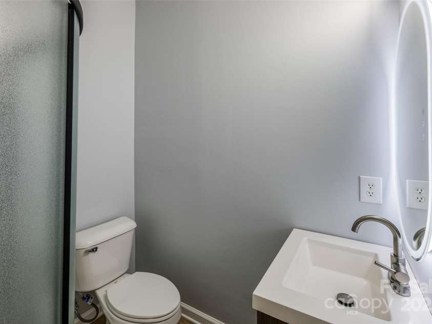 5726 Cactus Valley Road, Charlotte, NC 28277.  MLS# CAR4216456, YatesRealty ID 3996. 1st floor bathroom