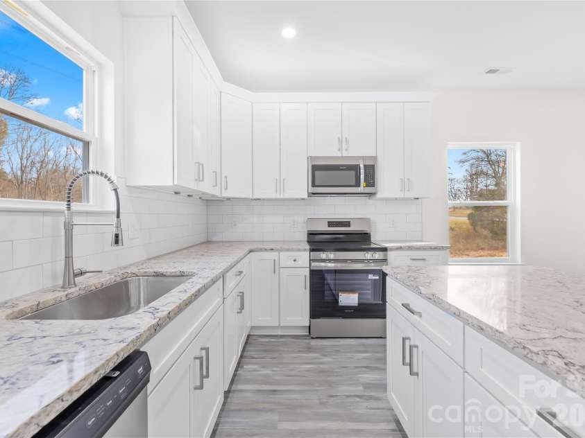 115 Railroad Avenue, East Spencer, NC 28039.  MLS# CAR4394930, YatesRealty ID 39961. Kitchen
