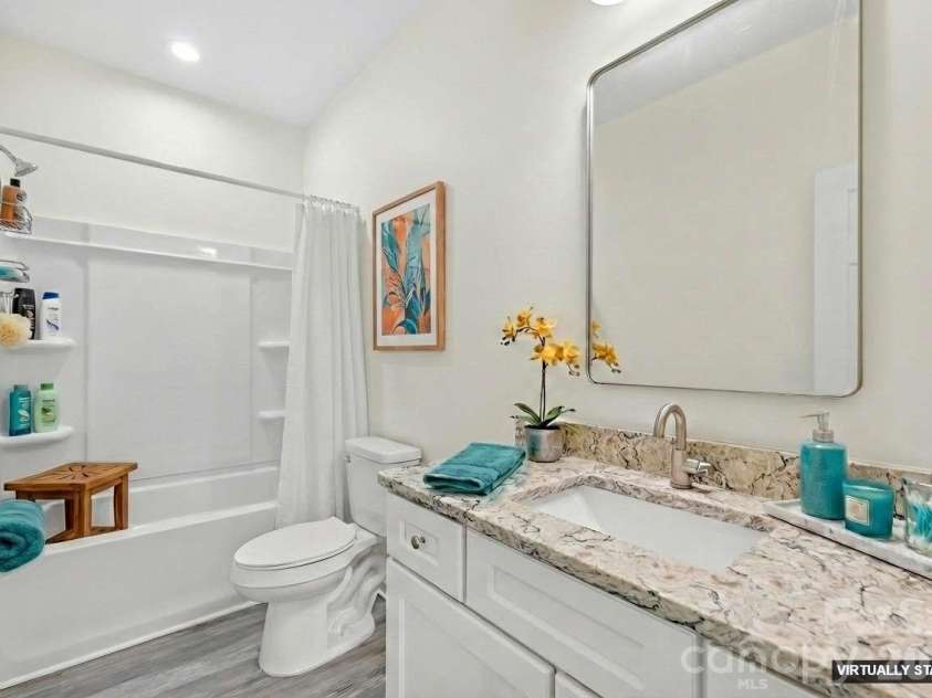 115 Railroad Avenue, East Spencer, NC 28039.  MLS# CAR4394930, YatesRealty ID 39961. Virtually Staged Bath