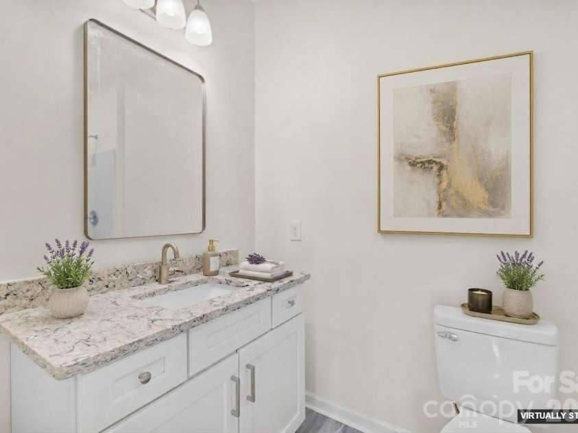 115 Railroad Avenue, East Spencer, NC 28039.  MLS# CAR4394930, YatesRealty ID 39961. Virtually staged bathroom