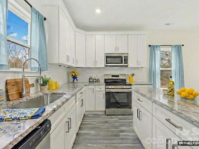 115 Railroad Avenue, East Spencer, NC 28039.  MLS# CAR4394930, YatesRealty ID 39961. Virtually Staged Kitchen