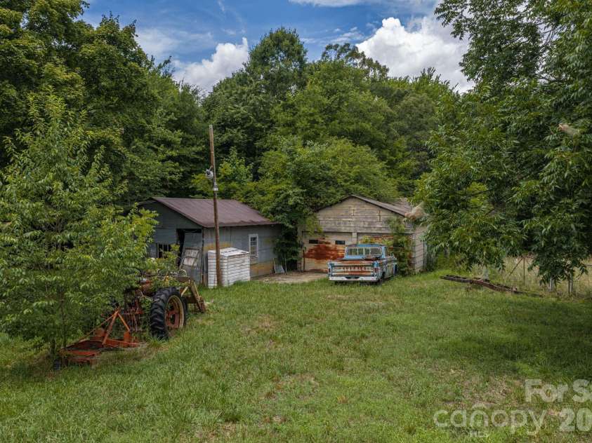 189 Campbell Lane, Lincolnton, NC 28092.  MLS# CAR4407220, YatesRealty ID 39964. Sheds behind the home