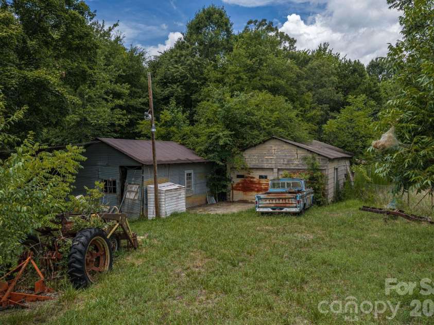 189 Campbell Lane, Lincolnton, NC 28092.  MLS# CAR4407220, YatesRealty ID 39964. Sheds behind the home