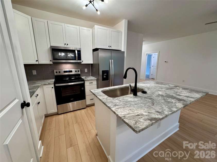 1010 John Street, Monroe, NC 28110.  MLS# CAR4407779, YatesRealty ID 39965. 