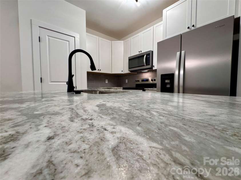 1010 John Street, Monroe, NC 28110.  MLS# CAR4407779, YatesRealty ID 39965. 