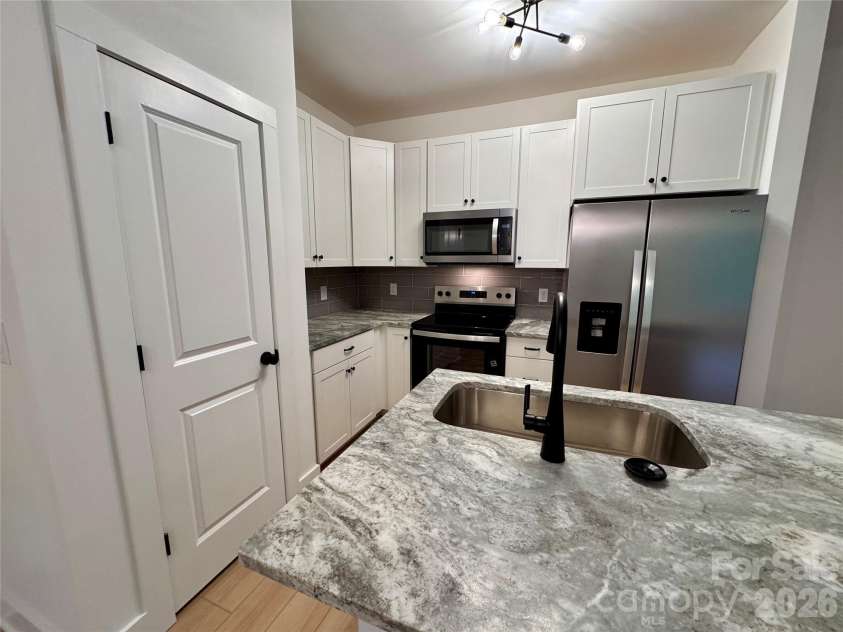 1010 John Street, Monroe, NC 28110.  MLS# CAR4407779, YatesRealty ID 39965. 