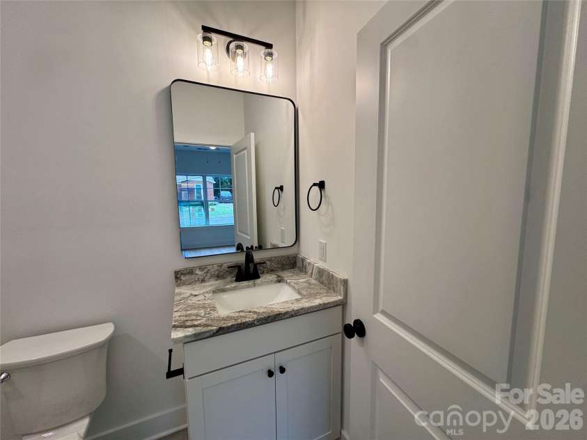 1010 John Street, Monroe, NC 28110.  MLS# CAR4407779, YatesRealty ID 39965. 