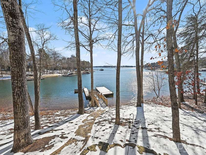 4526 Island Waters Drive, Denver, NC 28037.  MLS# CAR4341162, YatesRealty ID 3997. Backyard walkway to private dock and waterfront