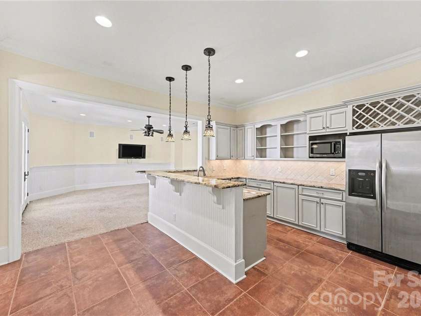 4526 Island Waters Drive, Denver, NC 28037.  MLS# CAR4341162, YatesRealty ID 3997. Lower level kitchen