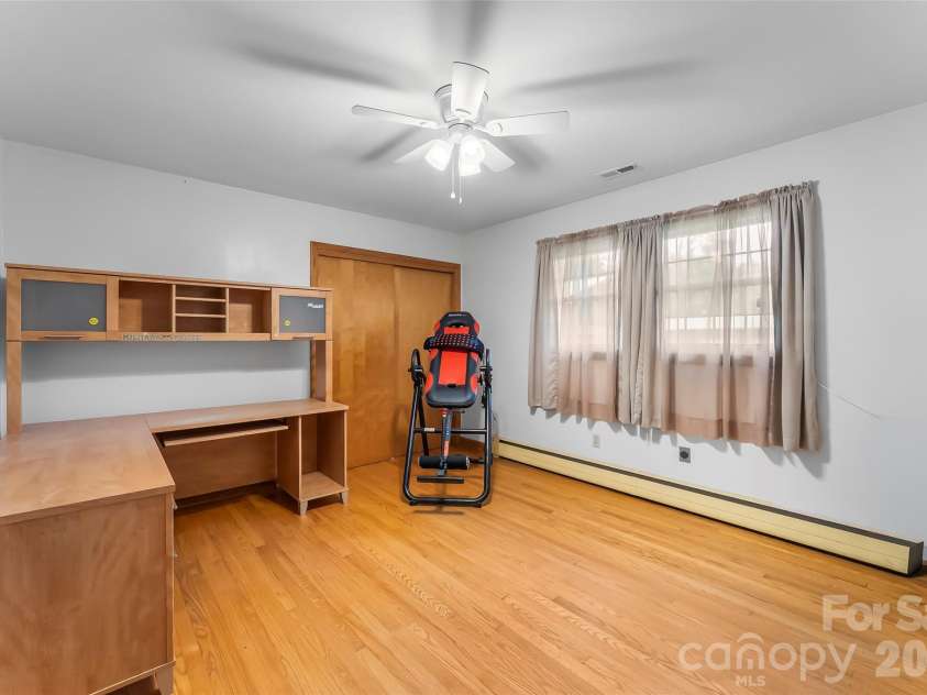 8647 US 221 Highway, Marion, NC 28752.  MLS# CAR4407828, YatesRealty ID 39972. Bedroom with laundry closet (laundry also in basement)