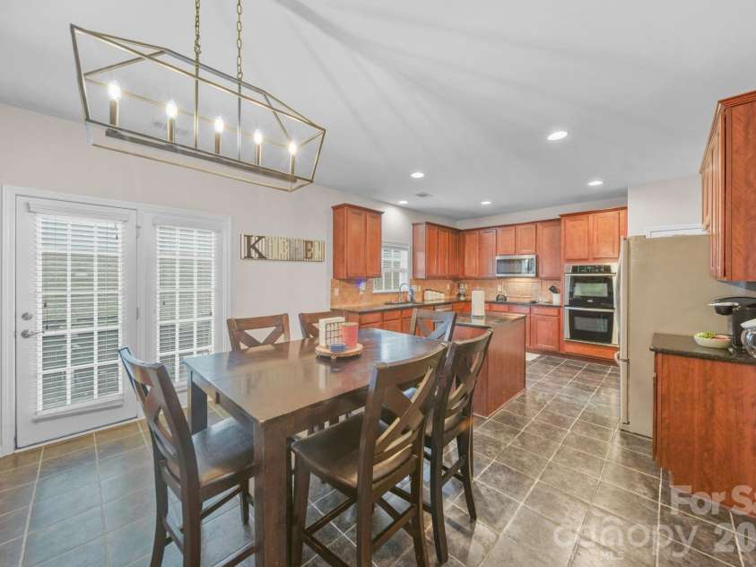 10906 Trout Creek Place, Davidson, NC 28036.  MLS# CAR4407543, YatesRealty ID 39976. Dining area