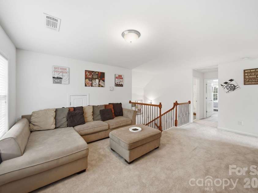 10906 Trout Creek Place, Davidson, NC 28036.  MLS# CAR4407543, YatesRealty ID 39976. Theater room