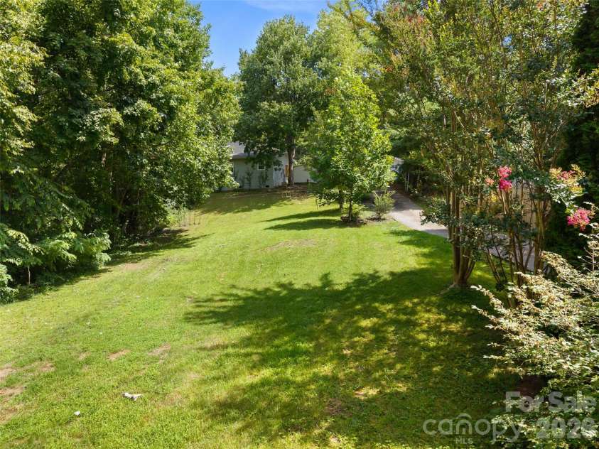 105 Big Bear Drive, Pisgah Forest, NC 28768.  MLS# CAR4403746, YatesRealty ID 39978. Lower yard