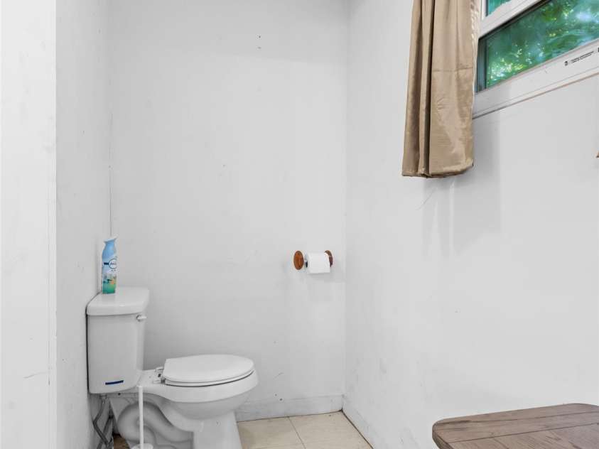 105 Big Bear Drive, Pisgah Forest, NC 28768.  MLS# CAR4403746, YatesRealty ID 39978. Out Building Bathroom