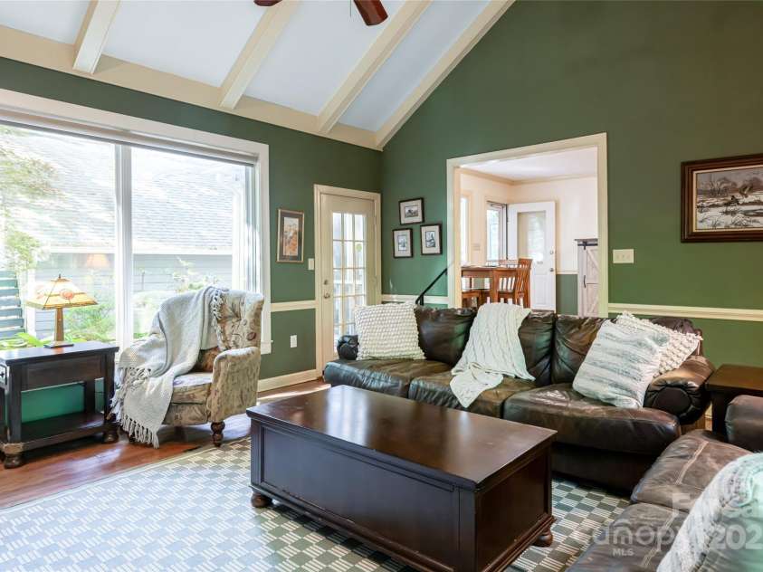 287 Anne Street, Rutherfordton, NC 28139.  MLS# CAR4258689, YatesRealty ID 3999. Den with windows looking over the brick patio spaces 