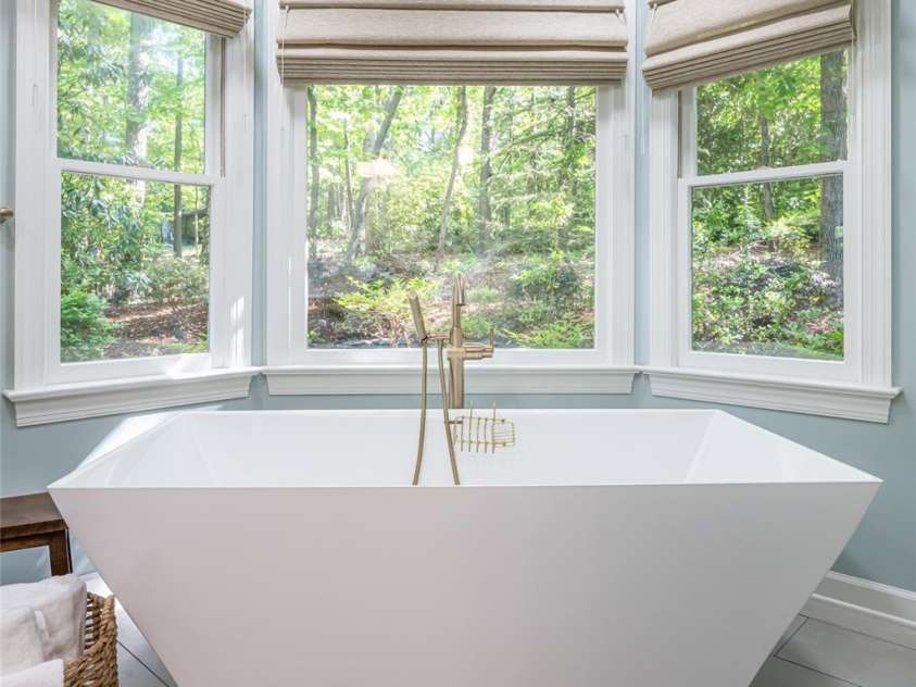 287 Anne Street, Rutherfordton, NC 28139.  MLS# CAR4258689, YatesRealty ID 3999. Soaking tub with woodland views