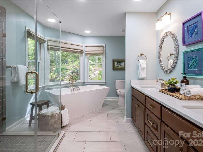 287 Anne Street, Rutherfordton, NC 28139.  MLS# CAR4258689, YatesRealty ID 3999. Spa like Primary Bathroom featuring soak tub, double vanities and large shower