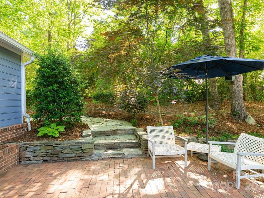 287 Anne Street, Rutherfordton, NC 28139.  MLS# CAR4258689, YatesRealty ID 3999. The second outdoor patio space located off the dining room 