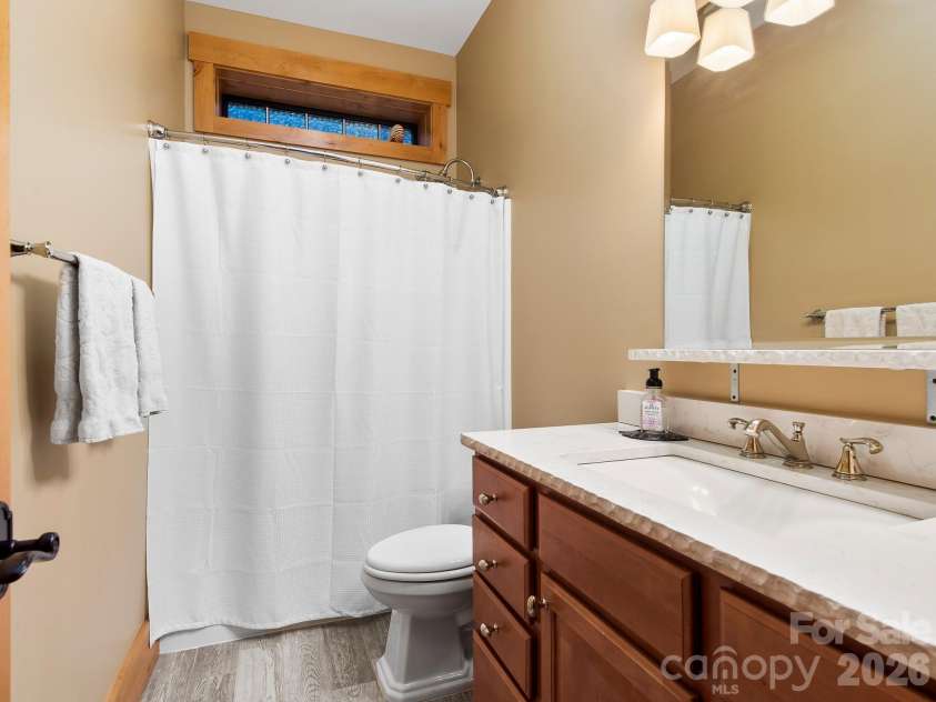 600 White Water Way, Marshall, NC 28753.  MLS# CAR4403673, YatesRealty ID 39990. Bathroom 2 on lower level with a tub/shower.