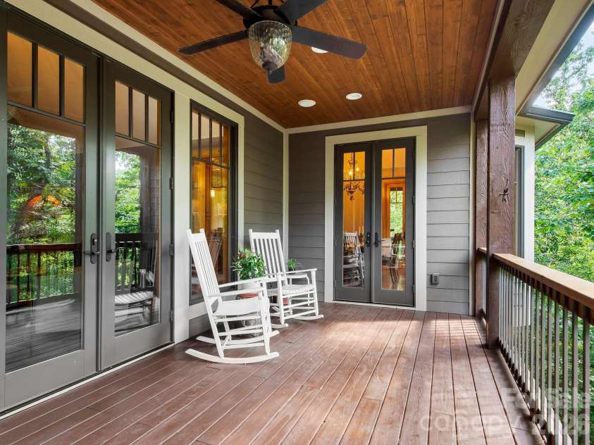 600 White Water Way, Marshall, NC 28753.  MLS# CAR4403673, YatesRealty ID 39990. Covered deck with entry from the dining room and primary bedroom.