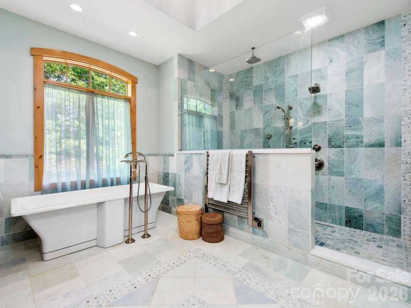 600 White Water Way, Marshall, NC 28753.  MLS# CAR4403673, YatesRealty ID 39990. Extra large walk-in shower and soaking tub.