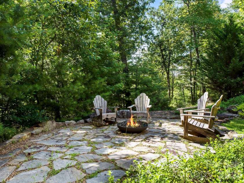 600 White Water Way, Marshall, NC 28753.  MLS# CAR4403673, YatesRealty ID 39990. Stone patio that is perfect for a fire pit.