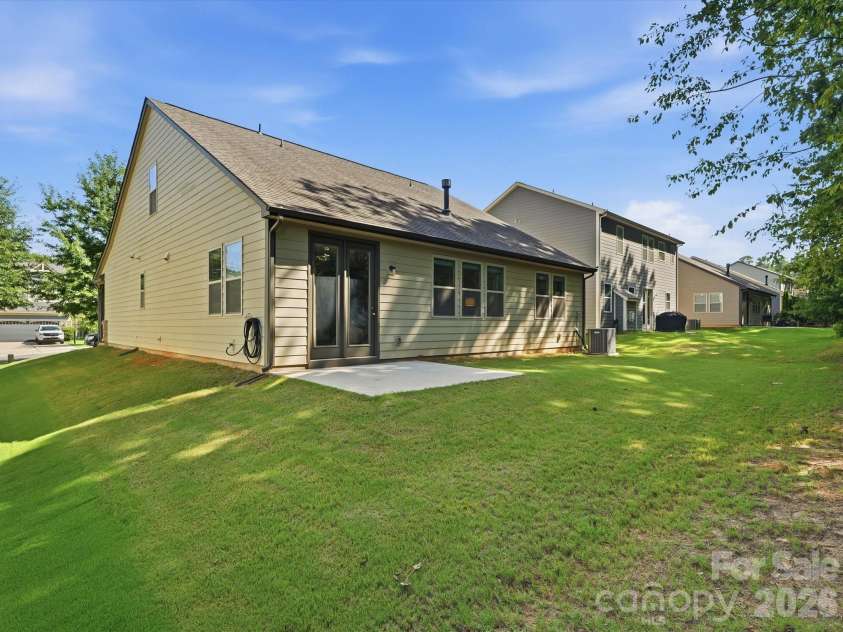 5353 Baker Lane, Clover, SC 29710.  MLS# CAR4401671, YatesRealty ID 39994. Backyard offering potential for customization or outdoor entertaining.